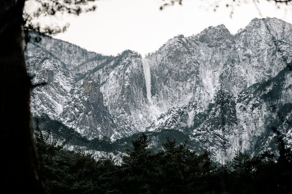 Snow Mountains - Experience the serene beauty of snow-covered mou #15443918