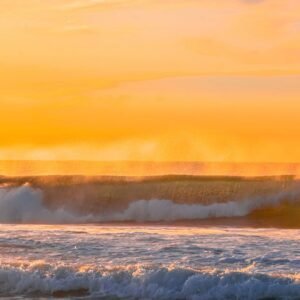 Lake Reflections - Vibrant sunset over ocean waves, capturing the b #16354185