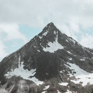 Snow Mountains - Stunning view of a rugged, snow-dotted mountain  #27240701