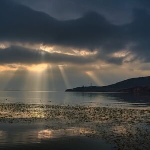 Lake Reflections - Tranquil sunset with sun rays breaking through c #6513744
