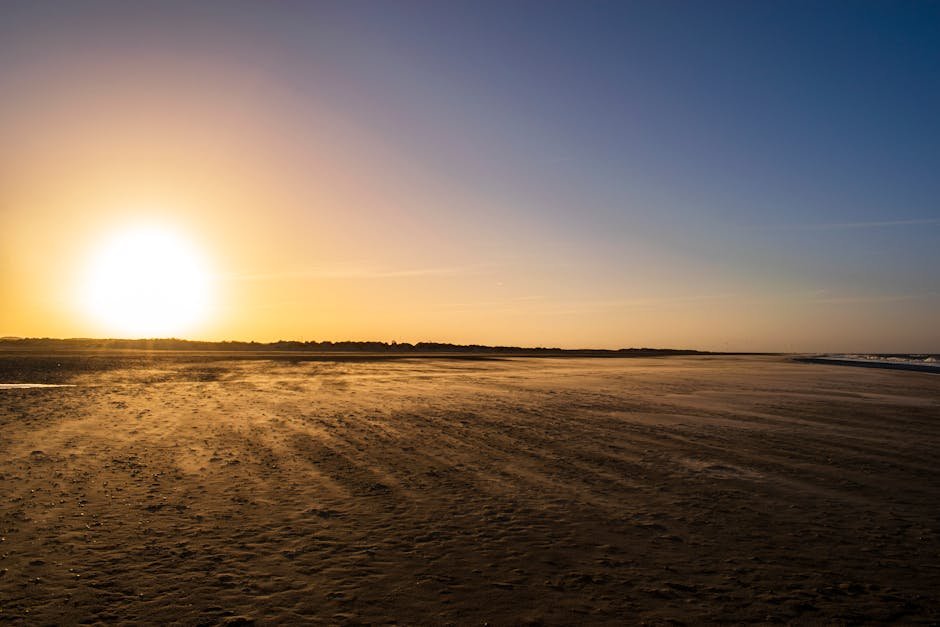 Beach Scenery - Serene sunset view over a deserted beach in Denm #7373041